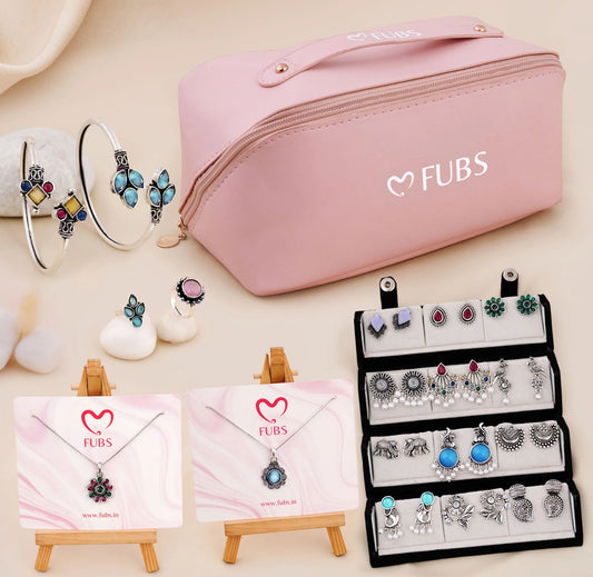 Purse of Surprises – 12 Earrings, 1 Folding Earrings Box, 2 Necklaces, 2 Bracelets, 2 Ring and 1 Sandesh Patra all kept hidden in a Premium Purse