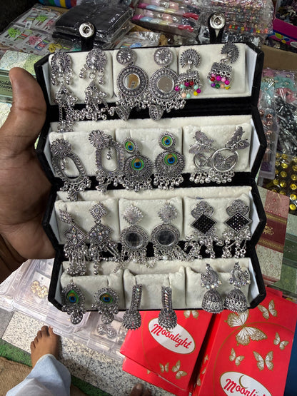 Set Of 12 Oxidized Designer Stud Earrings With Folding Jewelry Box