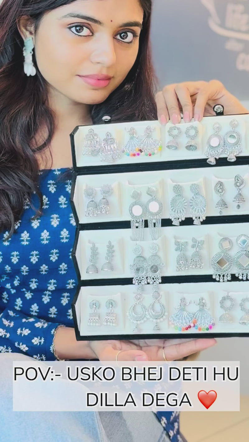 16 Pair of oxidised earing Reel 1